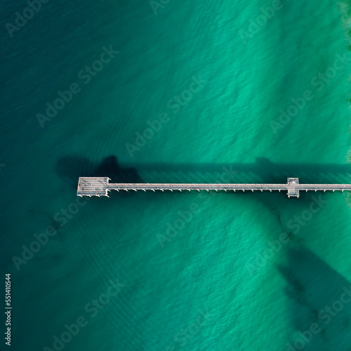 Aerial view of  wooden pier in northwest Florida vacation destination
