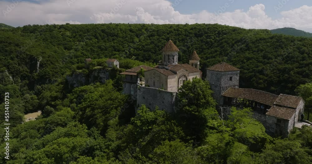Establishing shot of an area surrounding Motsameta Monastery in Gerogia, Near Kutaisi. Valley under the mountain. Establishing shot of an area surrounding Motsameta Monastery in Gerogia, Near Kutaisi. Valley under the mountain.