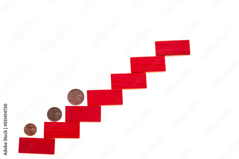 Euro coins rise up. euro coin on a red step ladder isolated on a white background.Euro exchange rate rises up.Euro growth. Euro coins rise up. euro coin on a red step ladder isolated on a white background.Euro exchange rate rises up.Euro growth.