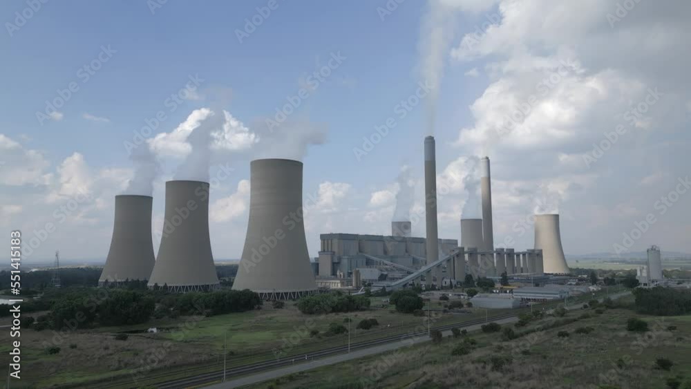 Aerial orbits steaming cooling towers at energy power plant station Aerial orbits steaming cooling towers at energy power plant station