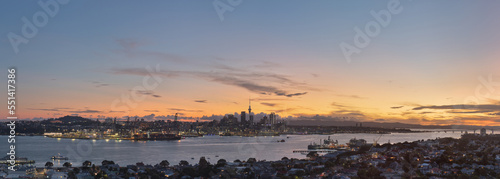 Auckland city and harbor viewed at sunset