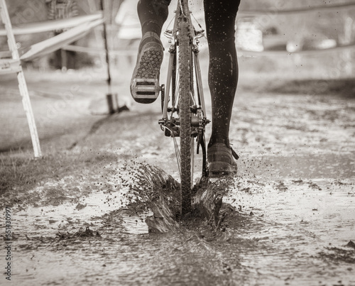 Cyclocross rider in the mud