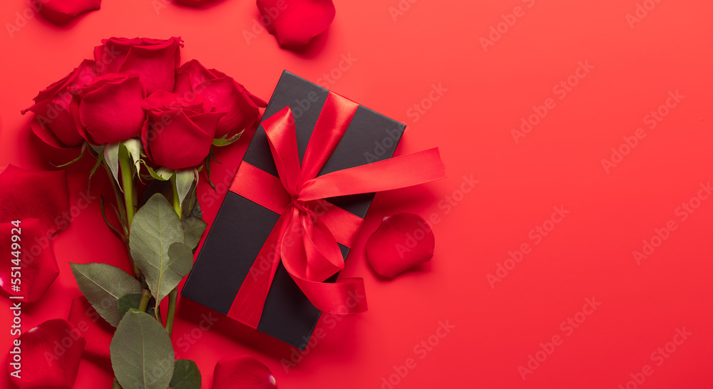 Valentines day card with gift box and rose flowers Valentines day card with gift box and rose flowers