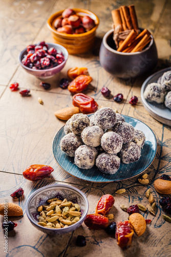 Energy vegan balls - raw dessert (bliss balls),  sugar free candies with ingredients, nut and fruits