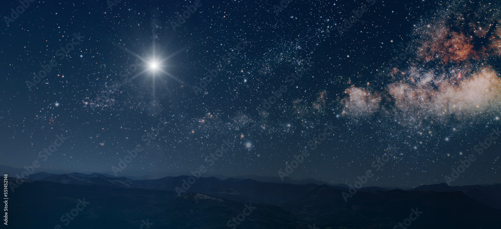 The star shines over the manger of christmas of Jesus Christ.