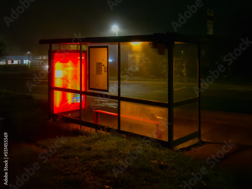 UK bus stop at night with an orange glow in Bracknell Forest Berkshire