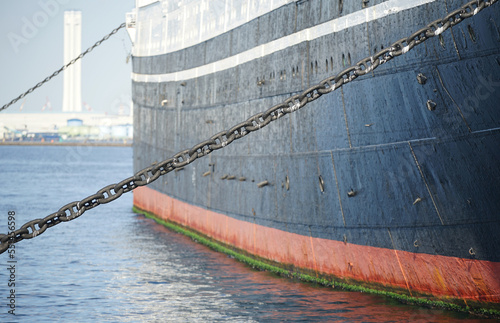 Wallpaper Mural The ship which it is moored with a chain, and anchors in the port Torontodigital.ca