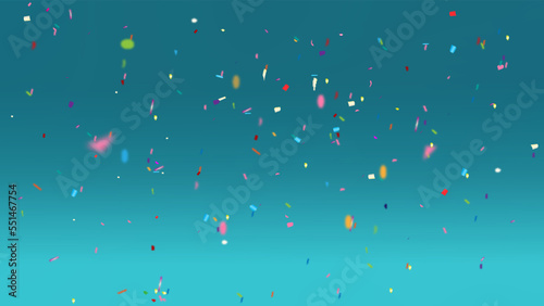 Drops of multicolored confetti on the blue background. Abstract background.