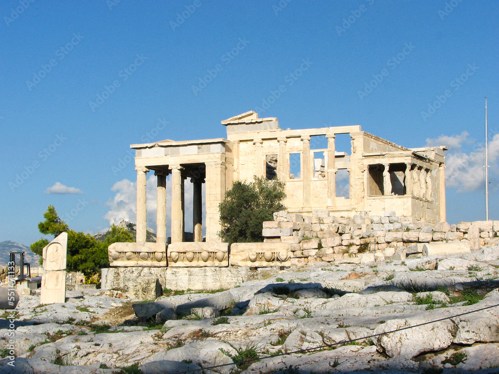 Athens, Greece - A view of The Erechtheion and its statues, located on the northern side of the Acropolis.  Image has copy space.