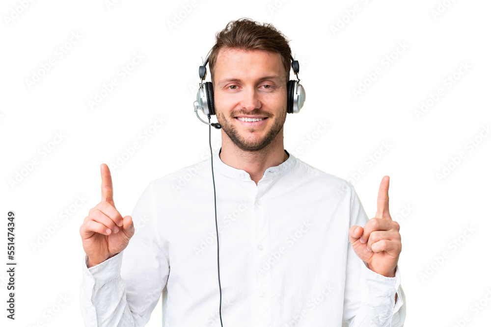Telemarketer caucasian man working with a headset over isolated chroma key background pointing up a great idea Telemarketer caucasian man working with a headset over isolated chroma key background pointing up a great idea