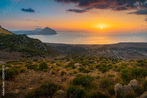 Sunset overlooking the Mediterranean coast. View from the top of Monte Monaco. Colorful sky. golden hour. Sicily. Italy