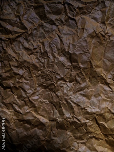 Abstract degrade brown crumpled paper texture background 