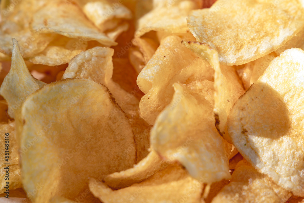 Crispy potato chips close up. Fast food. Selective focus