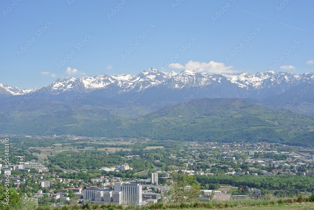 View of the city Grenoble in France with mountains in the background on a nice sunny day 