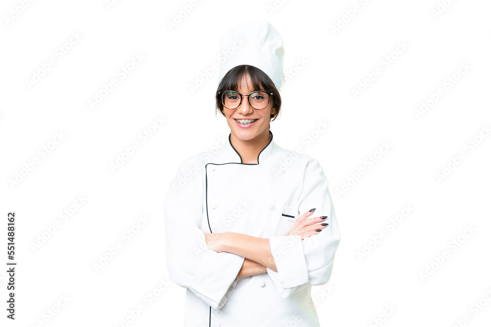 Young caucasian chef woman over isolated chroma key background keeping the arms crossed in frontal position Young caucasian chef woman over isolated chroma key background keeping the arms crossed in frontal position