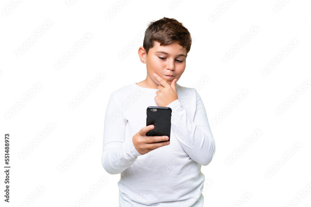 Little caucasian kid over isolated chroma key background thinking and sending a message Little caucasian kid over isolated chroma key background thinking and sending a message
