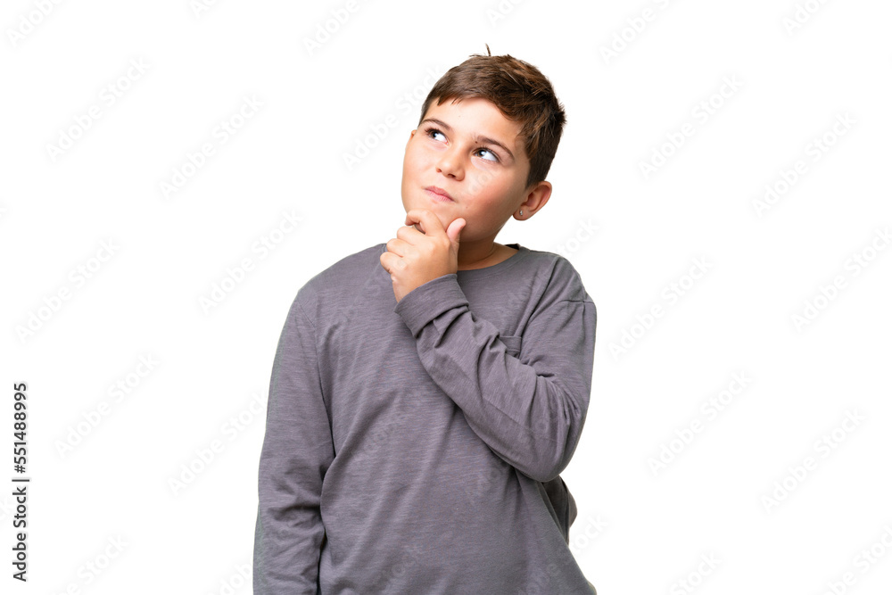 Little caucasian kid over isolated chroma key background and looking up Little caucasian kid over isolated chroma key background and looking up