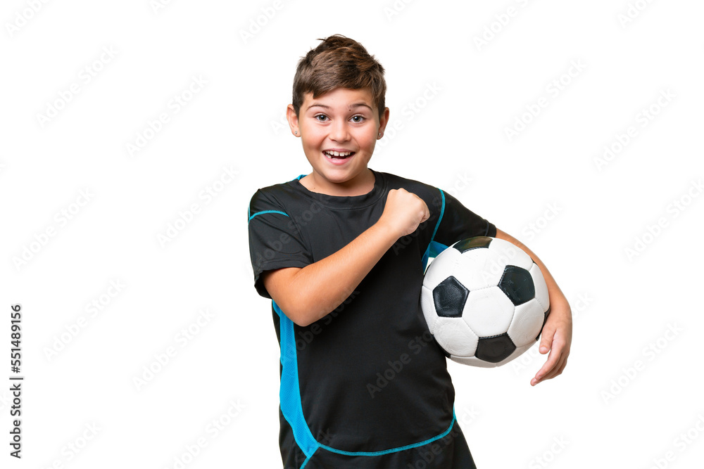 Little caucasian football player kid over isolated chroma key background celebrating a victory Little caucasian football player kid over isolated chroma key background celebrating a victory