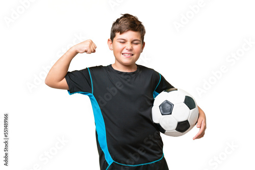 Little caucasian football player kid over isolated chroma key background doing strong gesture