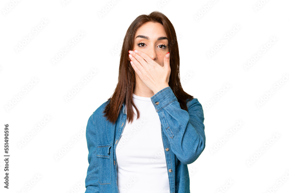 Young caucasian woman over isolated chroma key background covering mouth with hand Young caucasian woman over isolated chroma key background covering mouth with hand