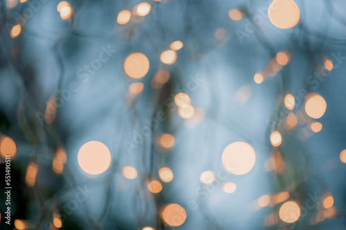 fairy lights abstract bokeh background in blue yellow orange