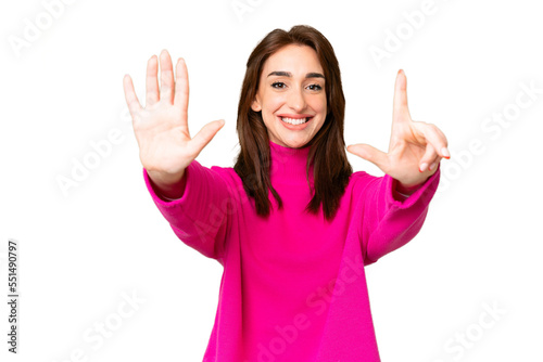 Young caucasian woman over isolated chroma key background counting seven with fingers