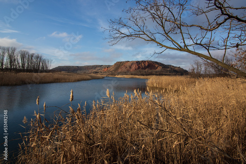 The lake is next to the terrecon of the coal mine. Donbas  Ukraine.