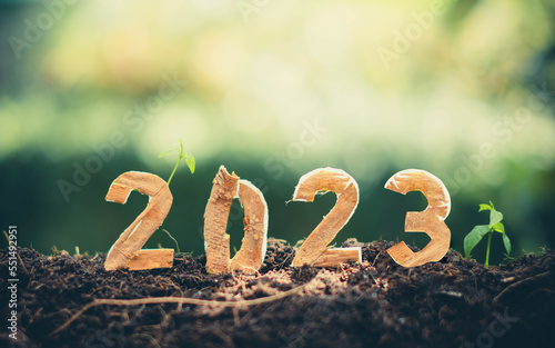 Happy New Year 2023 social media video.2022-2023 change background new year resolution concept.wood text on ground.Perfect for your invitation or office card.Christmas Day