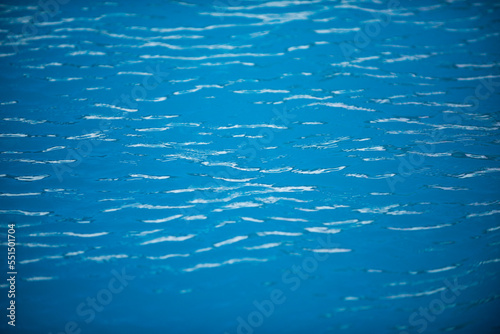 Background of water, surface blue swimming pool. © Volodymyr