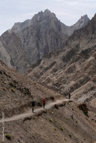 People hiking in the rocky mountains of ladakh. India's rugged little Himalayas