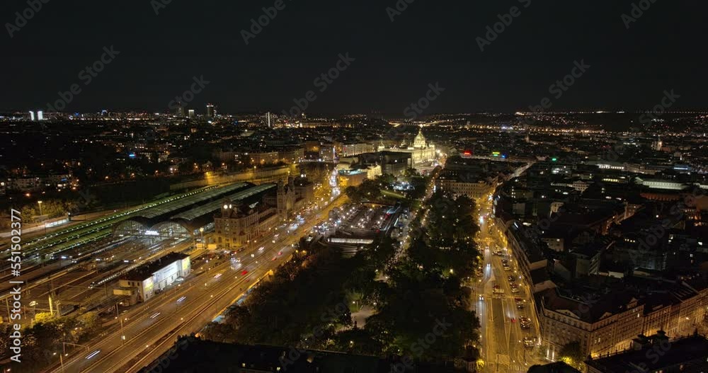 Prague Czechia Aerial v31 night hyper-lapse drone fly along wilsonova street capturing bustling downtown cityscape featuring main station and national museum - Shot with Mavic 3 Cine - October 2022 Prague Czechia Aerial v31 night hyper-lapse drone fly along wilsonova street capturing bustling downtown cityscape featuring main station and national museum - Shot with Mavic 3 Cine - October 2022