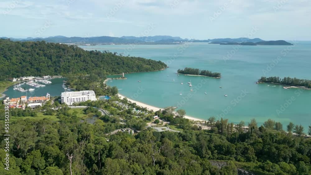 Aerial view of Pantai Kok Beach, Seratos island, and Telaga Harbour Marina Aerial view of Pantai Kok Beach, Seratos island, and Telaga Harbour Marina