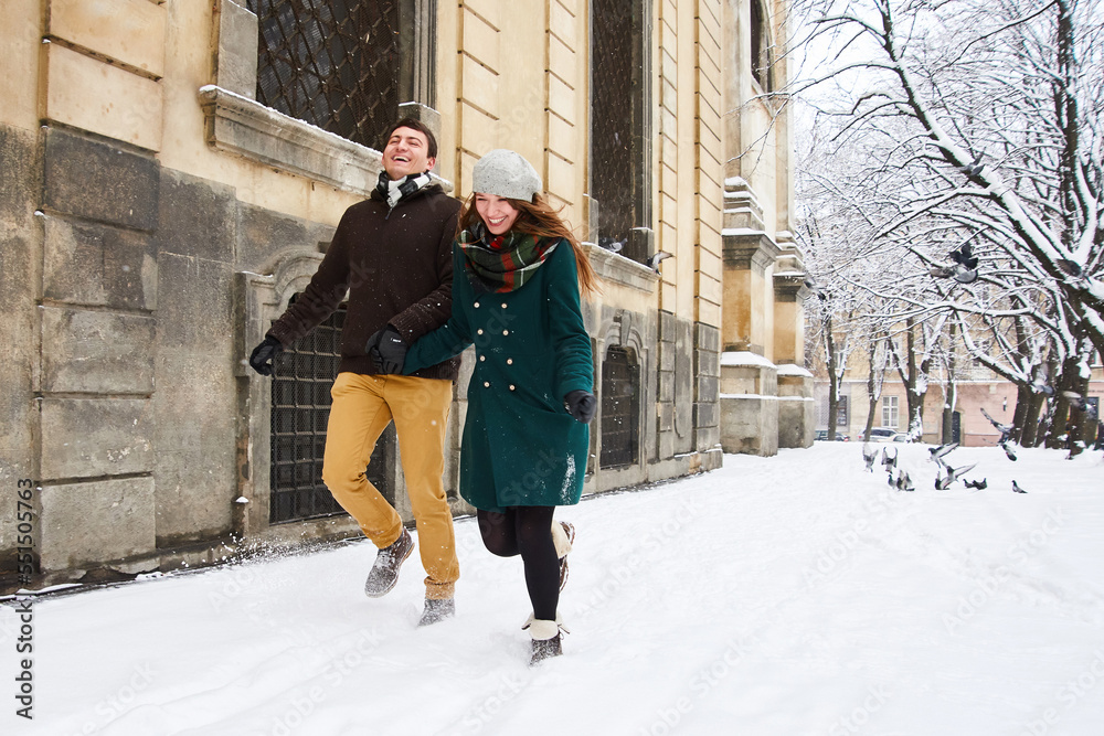 couple in love walking in city in winter vacation and holidays in Europe