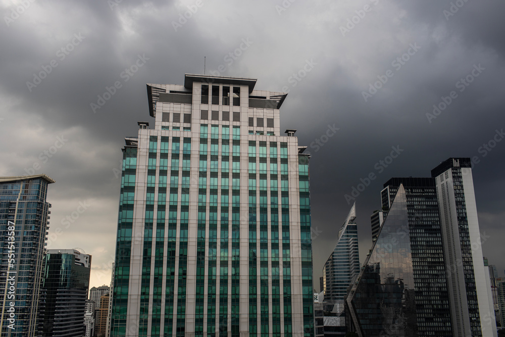 High rise office buildings on a grey and cloudy day High rise office buildings on a grey and cloudy day