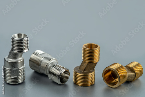 Two pairs of eccentrics connectors in brass and stainless steel. Eccentric mixer adapter faucet.