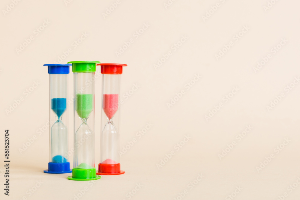 hourglass on the table, sand clock as time passing concept for business deadline, copy space hourglass on the table, sand clock as time passing concept for business deadline, copy space