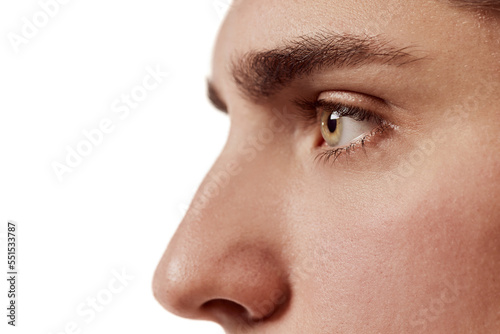 Fototapeta Naklejka Na Ścianę i Meble -  Side view portrait of young man isolated over white background. Nose, eyes. Plastic surgery. Concept of male beauty, body and skincare