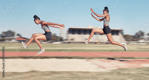 Foto Time lapse, long jump and woman running, jumping and cross in sand pit for fitness, training and exercise
