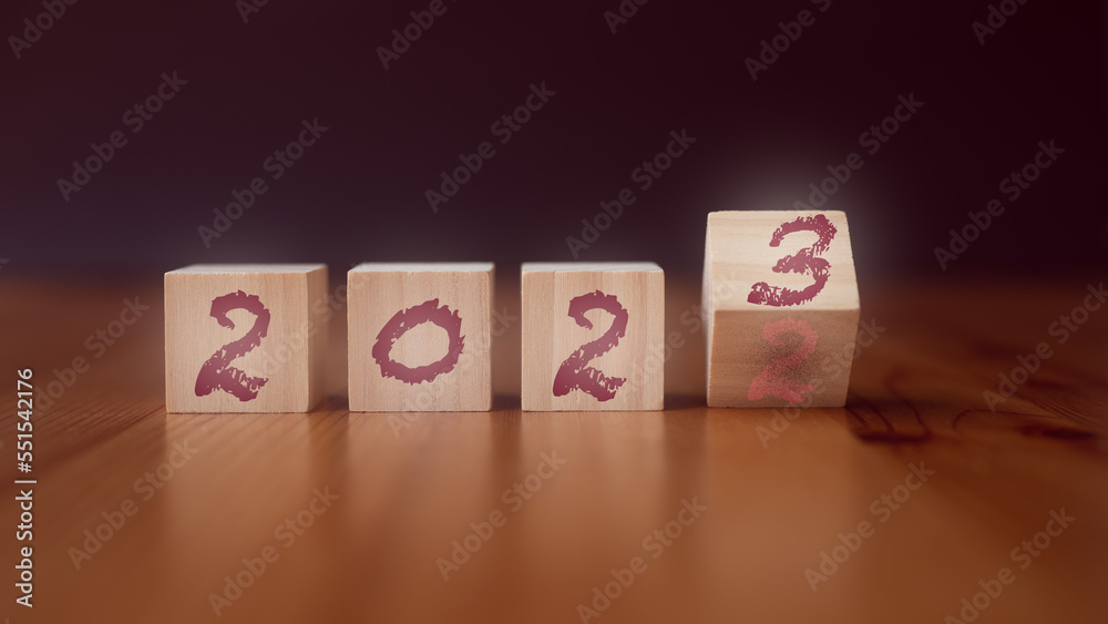wooden cubes with the text 2023 over background