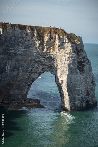The arch of the cliffs of Etretat from the top of the cliffs of Etretat at high tide