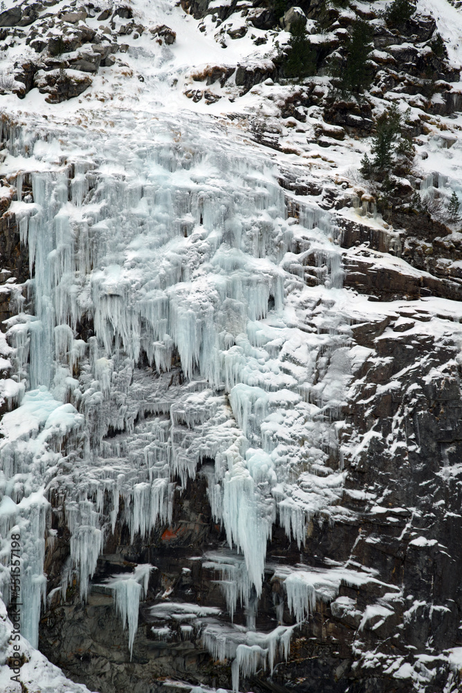 beautiful frozen waterfalls in winter in the alps, the hohe tauern national park in austria, at a cold winter day beautiful frozen waterfalls in winter in the alps, the hohe tauern national park in austria, at a cold winter day