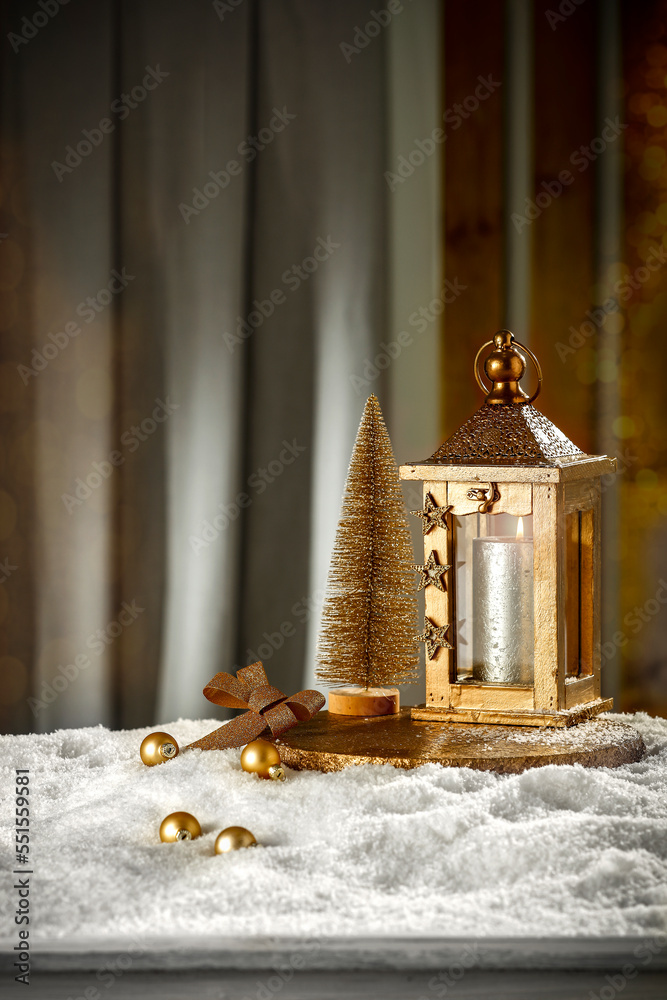 Fototapeta premium Christmas decorations on the table with snow free space in the evening mood