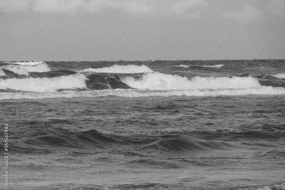 Waves on the sea in black and white