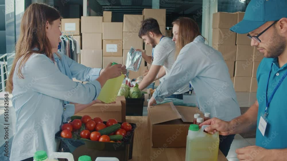 The Concept of Social Aid. Group of Volunteers Preparing Free Food ...