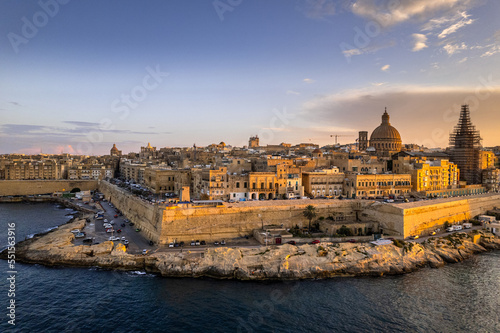 Valletta,Malta cityscape of old town at sunset, aerial drone view
