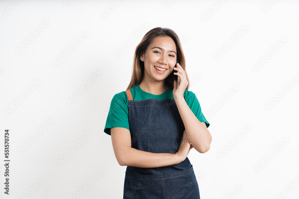 Young Asian business owners are excited by the good news while playing on their mobile phones isolate on white background, clipping path. Young Asian business owners are excited by the good news while playing on their mobile phones isolate on white background, clipping path.