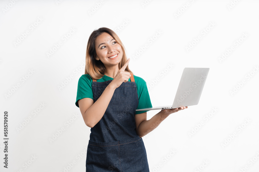 Young Asian business owners are excited by the good news while playing on computer laptop isolate on white background. Young Asian business owners are excited by the good news while playing on computer laptop isolate on white background.