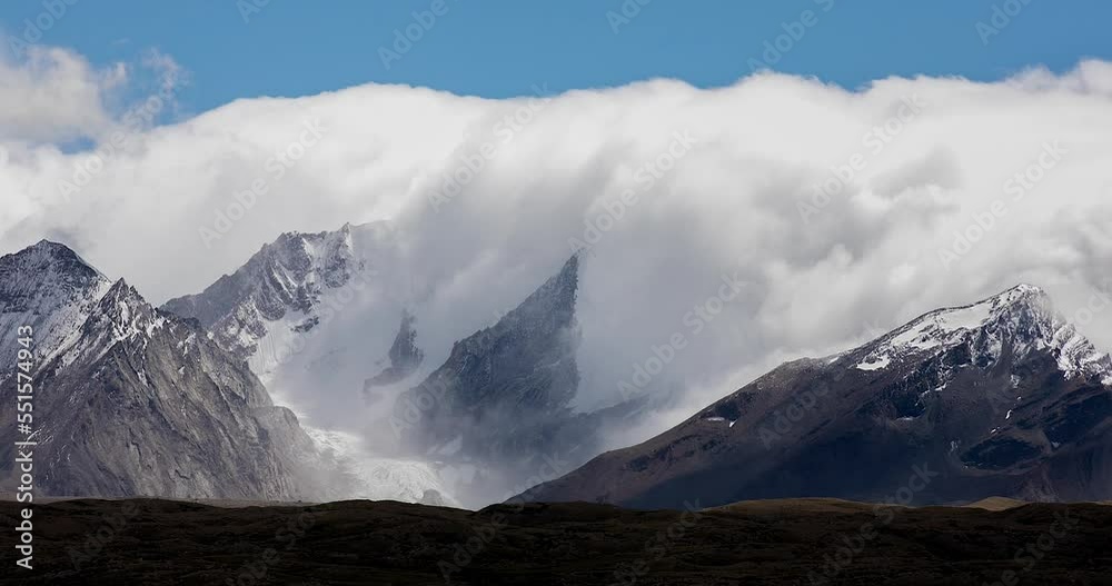 Clouds climb over the Himalayas, Tibet, China. Clouds climb over the Himalayas, Tibet, China.