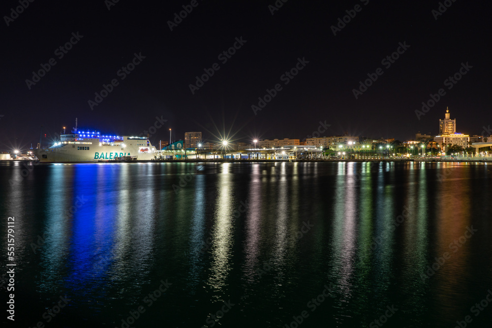Night view of port in Malaga, Spain on November 24, 2022