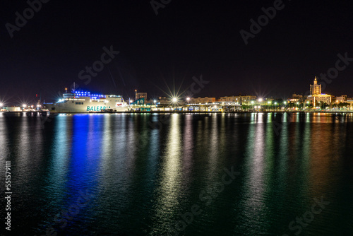 Night view of port in Malaga, Spain on November 24, 2022